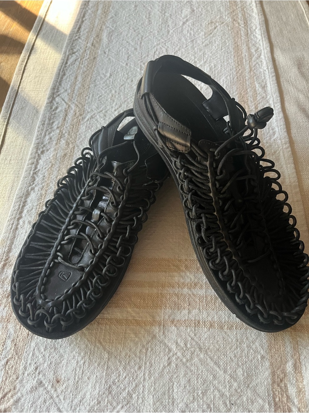 Keen UNEEK Black Leather Woven Cord Sandals